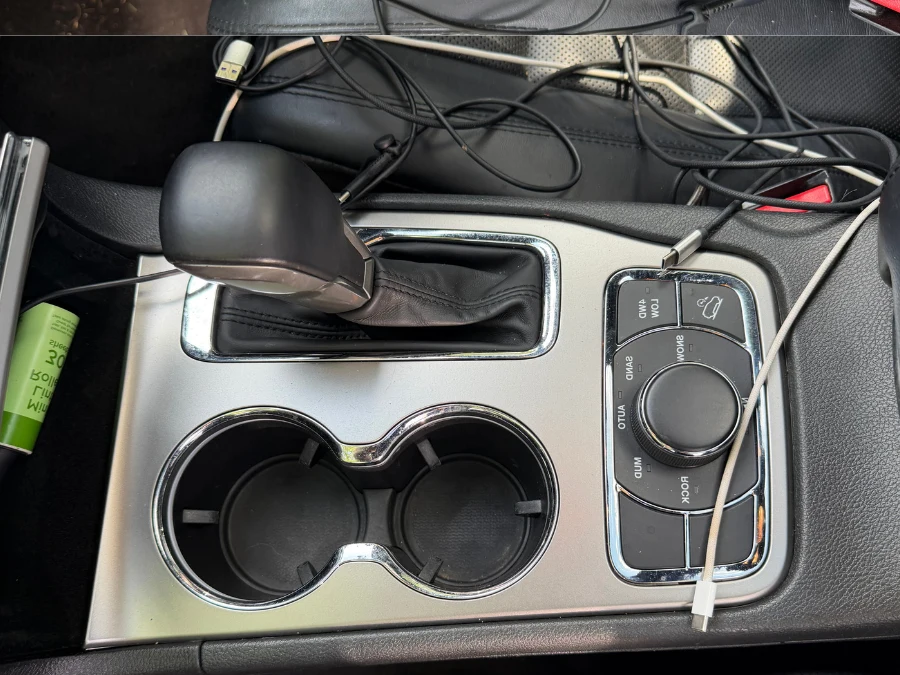 Vehicle center console and cup holders after detailing — Grove City, Ohio