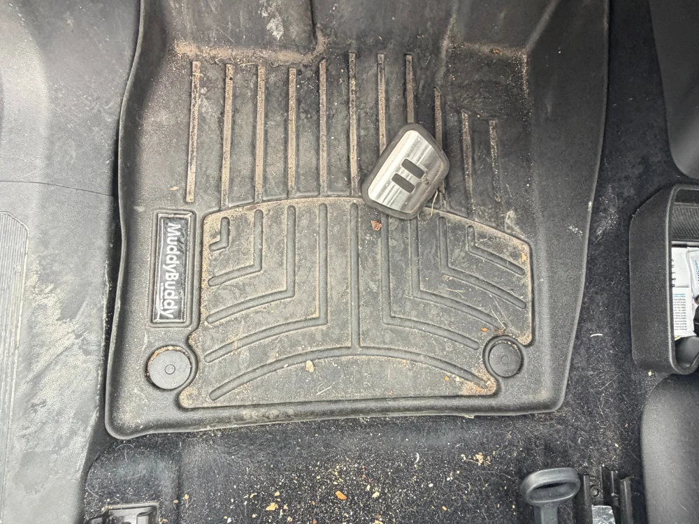 Muddy floor mats before detailing — Powell, Ohio